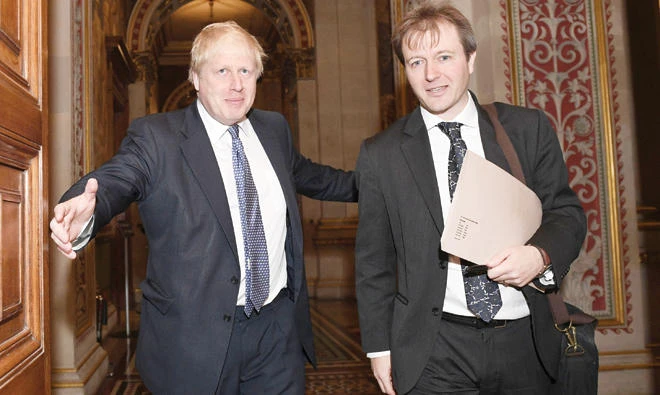 Britain’s Foreign Secretary Boris Johnson with Richard Ratcliffe, the husband of British-Iranian woman Nazanin Zaghari-Ratcliffe who is jailed in Iran, at the Foreign and Commonwealth Office in London on Wednesday. (AFP)