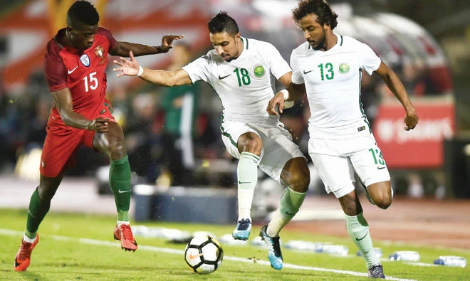 Following Saudi Arabia, the UAE and Bahrain’s non-response to organizers’ invitations, it seems highly unlikely KSA’s Salem Al-Dawsari and the UAE’s Omar Abdulrahman (left) will feature in the tournament next month. (AFP)