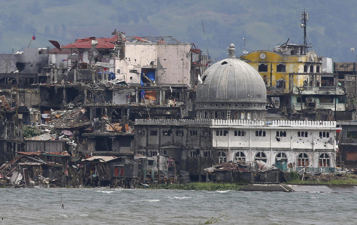 A mosque with its dome blasted at the battle-scarred Marawi City in southern Philippines. Philippine troops are pushing on with a new offensive against the Bangsamoro Islamic Freedom Fighters after crushing an alliance of pro-Daesh militants in Marawi. (AP)
