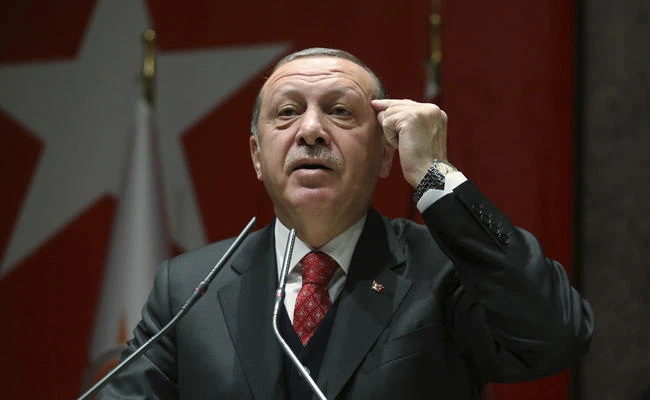Turkey's President Recep Tayyip Erdogan addresses to his ruling party's provincial leaders in Ankara on Friday, Nov. 17, 2017. (Presidential Press Service, pool photo via AP)