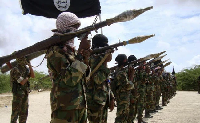 Al Shabab militants parade new recruits after arriving in Mogadishu from their training camp south of the capital in this file photo. The US military has quietly upped the tempo of its operations in Somalia, conducting a growing number of drone strikes against Al-Qaeda affiliated Al-Shabab militants and other terrorists. (REUTERS/Feisal Omar/Files)