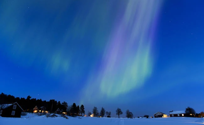 In this March 17, 2013 file photo, the Aurora Borealis bright up the sky at twilight between the towns of Are and Ostersund, Sweden. AFP PHOTO/JONATHAN NACKSTRAND