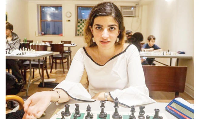 Dorsa Derakhshani, 19, playing chess at the Marshall Chess Club in New York. (AN photo by James Reinl)