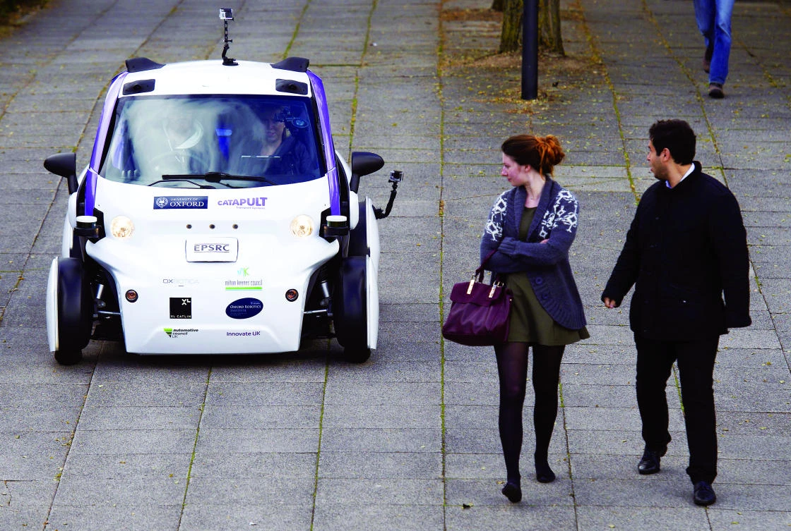An autonomous self-driving vehicle being tested in a pedestrianized zone in Milton Keynes, north of London, on Oct. 11, 2016. (AFP)