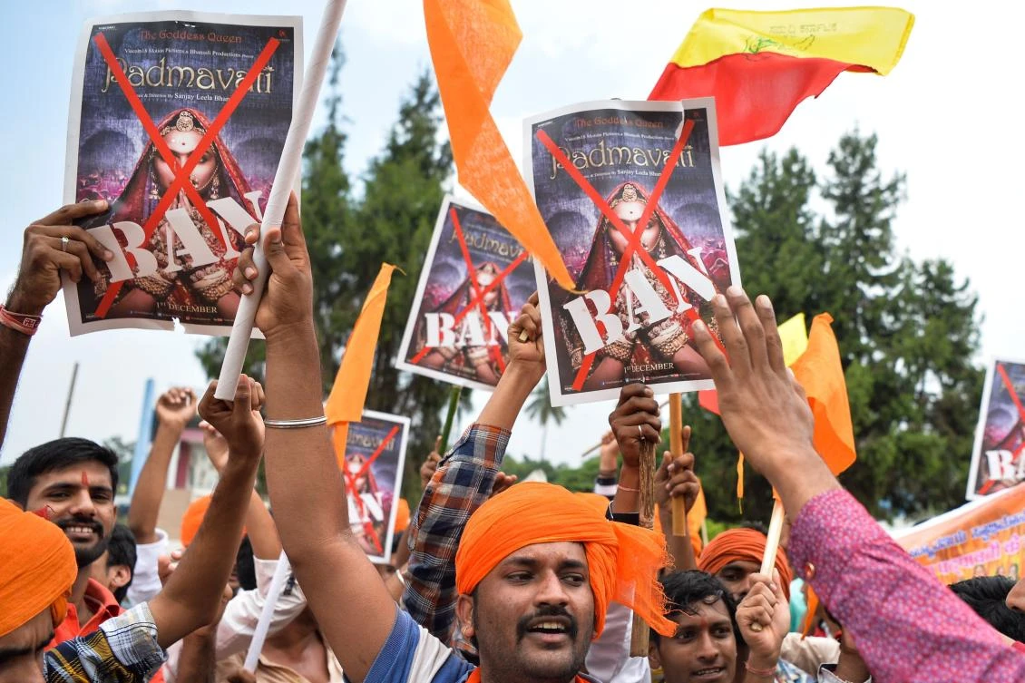 Members and activists of the Karnataka wing of Rashtriya Rajput Karni Sena caste organization hold posters demanding the ban on screening of Bollywood movie ‘Padmavathi’, in Bangalore on Nov. 15, 2017. The activists alleged that the movie directed by Sanjay Leela Bhansali at a cost of 1900 million Indian rupees distorts the historical facts. (AFP/Manjunath Kiran)