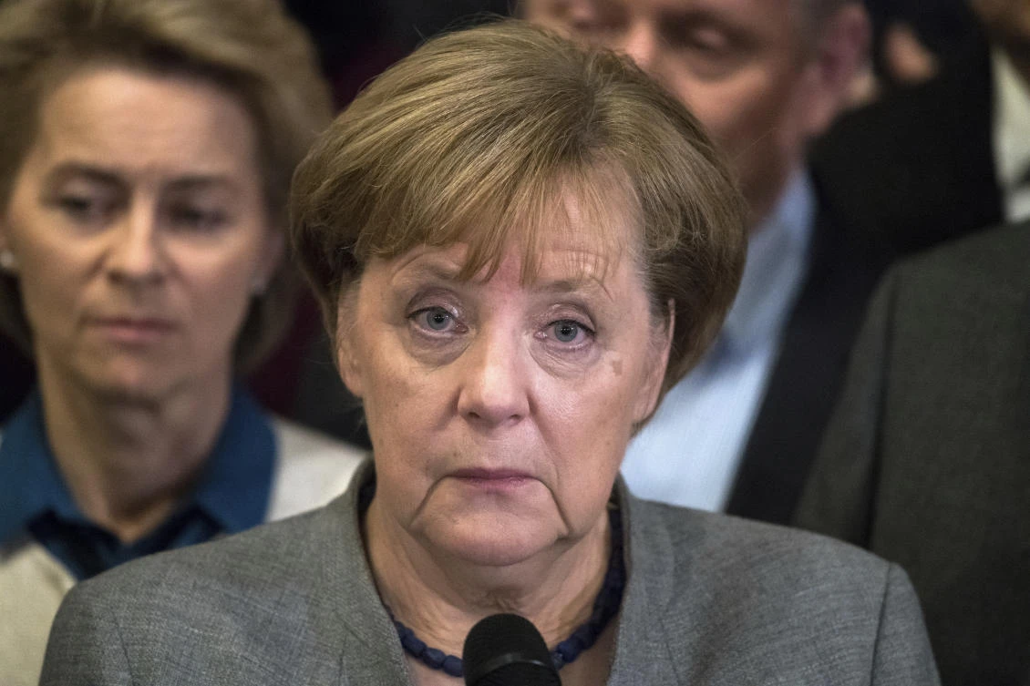 German Chancellor Angela Merkel gives a statement after the pre-talks on forming a new German government failed early Monday, Nov. 20, 2017 in Berlin. (Bernd von Jutrczenka/dpa via AP)