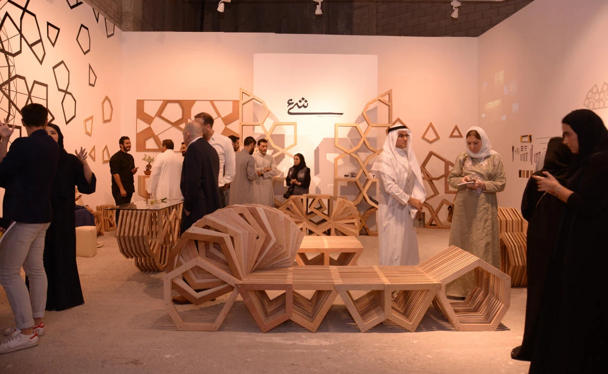 Attendees admiring the innovative designs of Ahmad Angawi at Tasmeem Fair in Jeddah on November 18, 2017. (AN photo by Huda Bashatah)