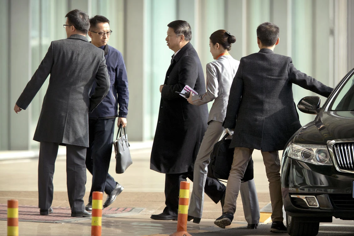 Song Tao, center, the head of China’s ruling Communist Party’s International Liaison Department, arrives at Beijing Capital International Airport in Beijing, Friday on his way to Pyongyang to meet North Korean officials. (AP)