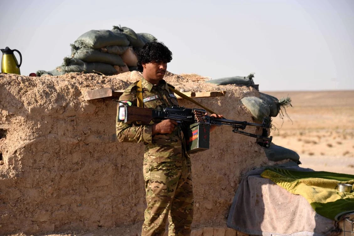 An Afghan security force keeps watch at a checkpoint in Maiwand district of Kandahar province. (AFP)
