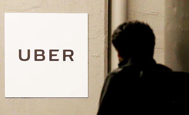 A man arrives at the Uber offices in Queens, New York, U.S., in this February 2, 2017 photo. (REUTERS)