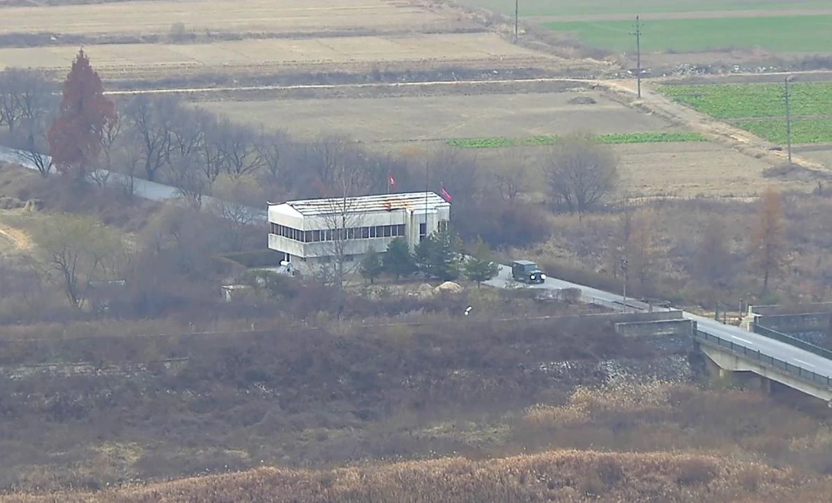 This screengrab made from video footage released by the United Nations Command on Nov. 22, 2017 shows a North Korea defector driving along a road leading to the truce village of Panmunjom. Dramatic footage of a North Korean soldier’s defection released on Nov. 22 showed him racing across the border under fire from former comrades, and then being hauled to safety by South Korean troops. The defector, who ran across the border at the Panmunjom truce village on Nov. 13, was shot at least four times and has been recovering in a South Korean hospital. (AFP/United Nations Command (UNC))