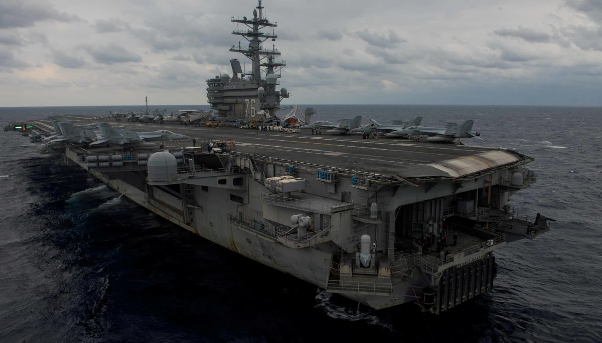 Above, the aircraft carrier USS Ronald Reagan steams the Philippine Sea during Annual Exercise 2017, joint military training between the US Navy and the Japan Maritime Self-Defense Force. Three US sailors remain missing after a C-2A “Greyhound” aircraft with 11 people on board went down Wednesday afternoon while on their way to the USS Ronald Reagan. (Reuters)