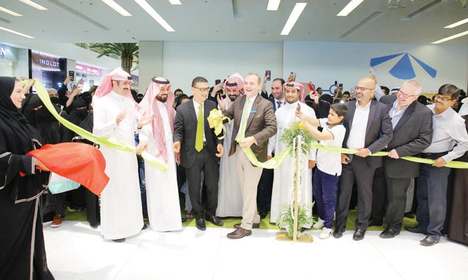 A cake-cutting ceremony at the opening of the new Home Centre store in Abha.