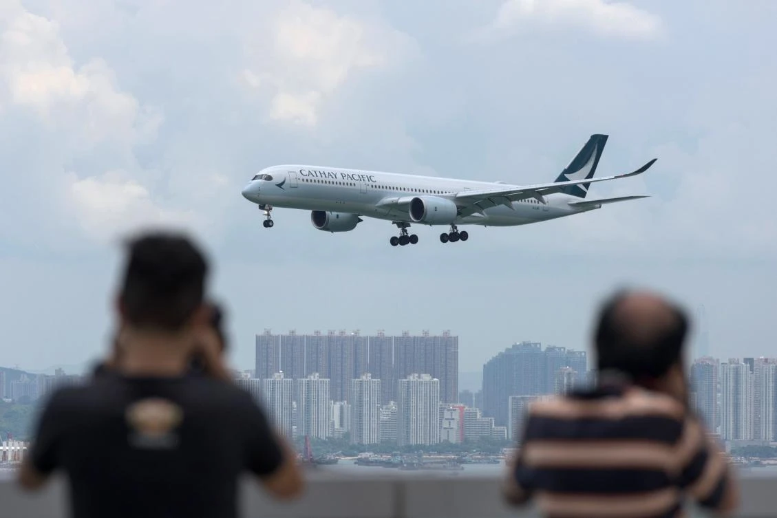 While Cathay Pacific is not firing any of its 2,500 Hong Kong-based pilots, it has warned of cuts next month to their housing allowances, which for some veteran captains can be worth up to HK$100,000 (SR48,017) a month. (AFP)