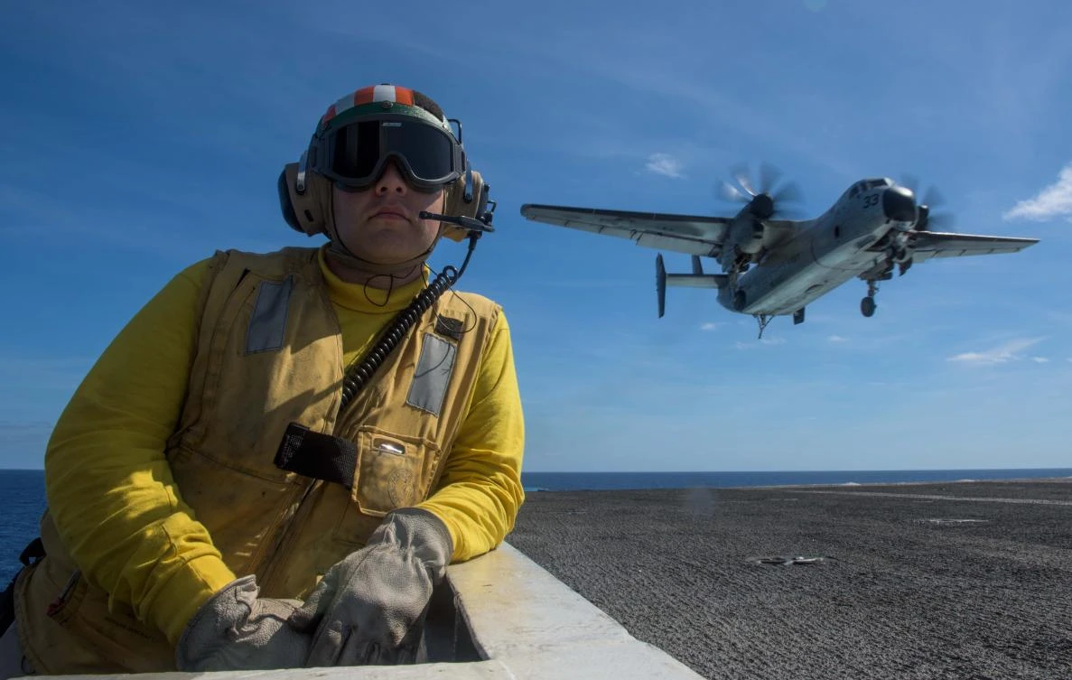 Above, a handout photo by the US shows as a C-2 Greyhound preparing to land aboard the aircraft carrier USS Ronald in the Pacific Ocean. The latest Navy accident in the Asia Pacific comes after two deadly incidents in the region involving US warships. (Courtesy US Navy)