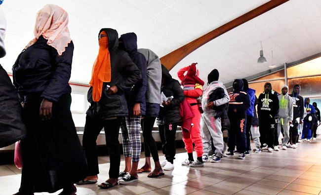 Ivorian migrants returning from Libya to be repatriated in their country arrive at the airport of Abidjan, in this November 20, 2017 photo. (AFP)