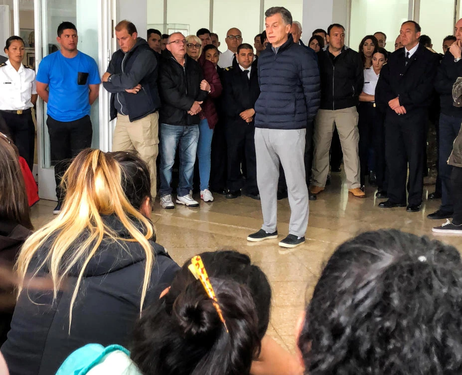 Argentina’s President Mauricio Macri speaks to relatives of the 44 crew members of the ARA San Juan submarine, which has been missing at sea, at an Argentine Naval Base in Mar del Plata on November 20. (Reuters)