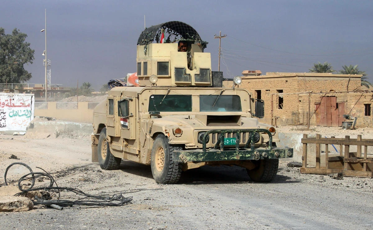 This file photo shows picture shows an Iraqi forces humvee on the road near the Rawa area during an operation to retake the Euphrates Valley town from the Daesh group on November 17, 2017. (AFP)
