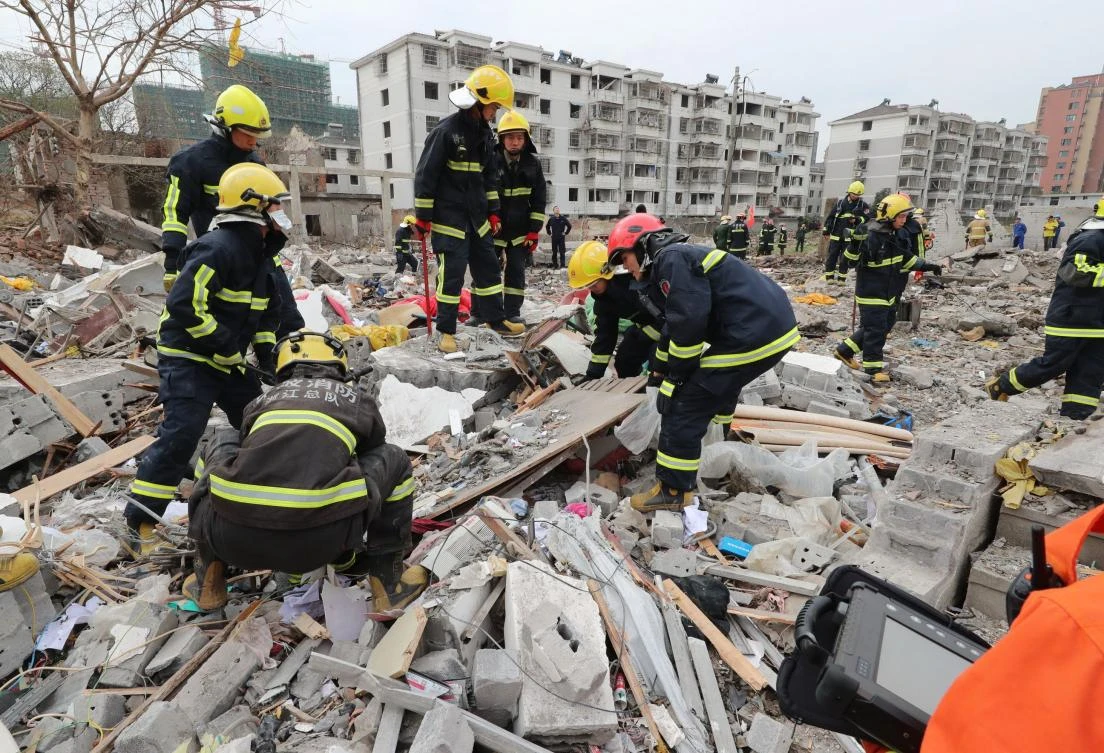 Above, rescue workers look for survivors after an explosion in Ningbo, China’s eastern Zhejiang province. The blast sent dozens to hospitals, destroyed vehicles and triggered the collapse of nearby buildings, state media said. (AFP)