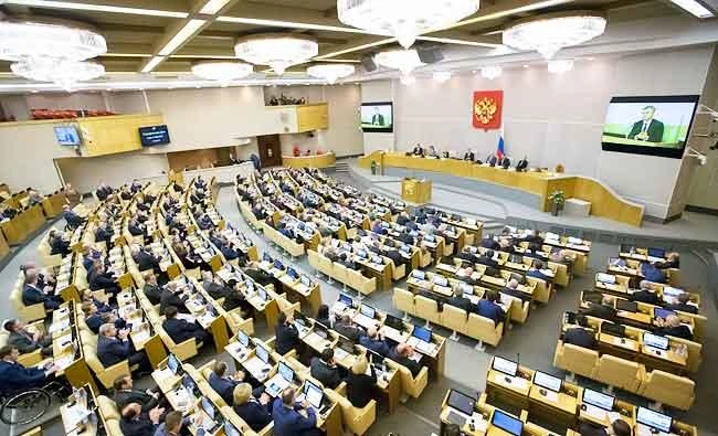 Russian lawmakers applaud after voting in the State Duma, the Lower House of the Russian Parliament in Moscow, Russia, in this Nov. 15, 2017 photo. (AP)