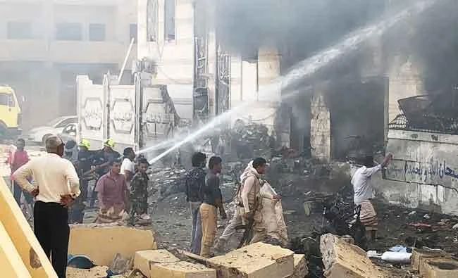 Yemeni firefighters douse flames following an explosion near a security post in the southern port city of Aden, in this November 14, 2017 photo. (AFP)