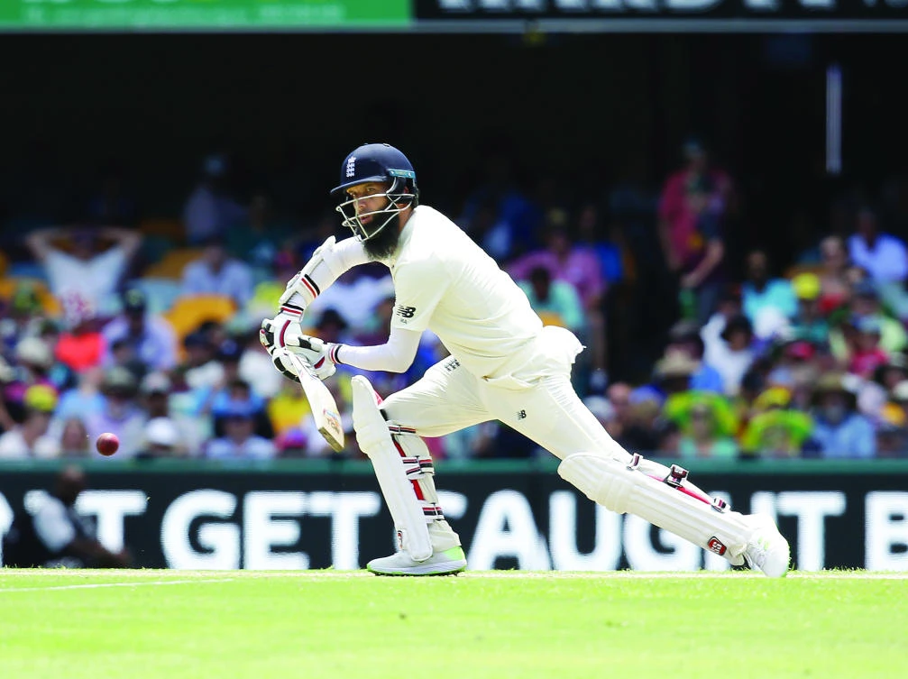 England's Moeen Ali plays a shot against Australia during their first Ashes Test in Brisbane. (AP photo)