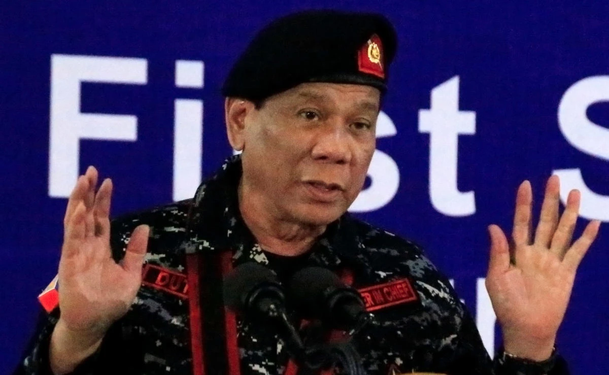 Philippine President Rodrigo Duterte, wearing a military uniform, gestures as he delivers a speech during the 67th founding anniversary of the First Scout Ranger regiment in San Miguel town, Bulacan province, north of Manila, Philippines on November 24, 2017. (REUTERS)