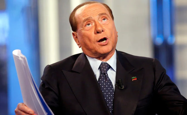 Italy's former Prime Minister Silvio Berlusconi gestures as he attends television talk show "Porta a Porta" (Door to Door) in Rome, Italy, ON November 30, 2016. (REUTERS/Remo Casilli/File Photo)