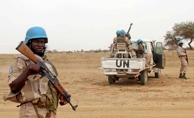 UN peacekeepers stand guard in the northern town of Kouroume, Mali, in this May 13, 2015 file photo. (REUTERS)