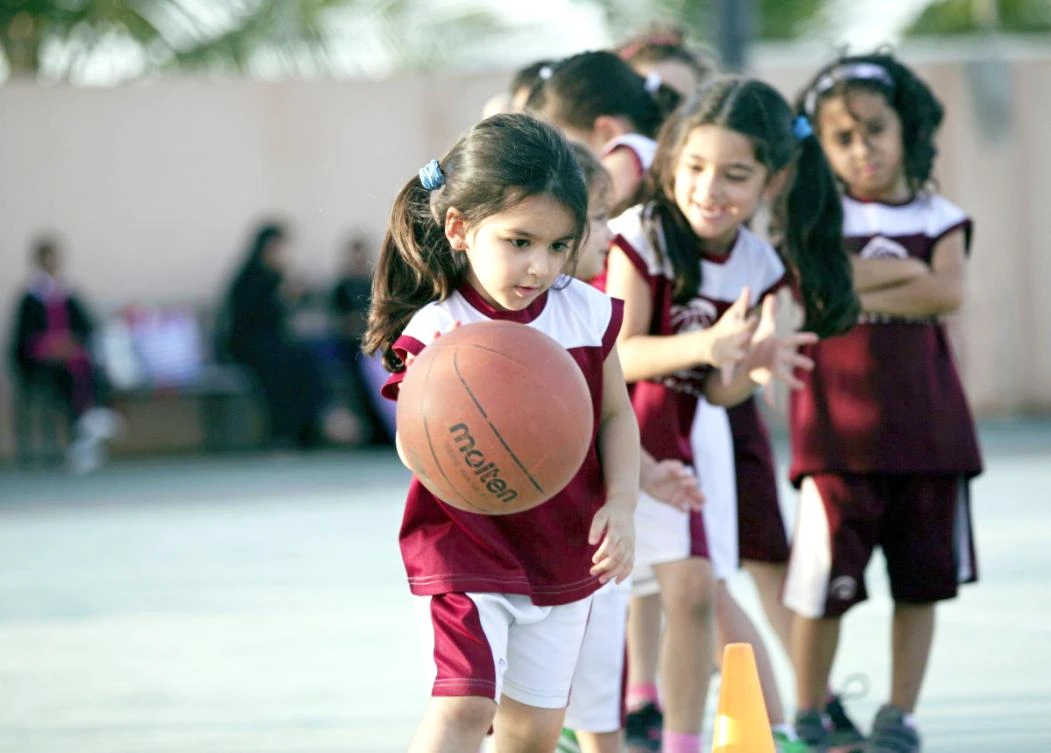 This 2014 file photo shows a basketball drill at a private club in Jeddah. Physical education classes will soon be offered to girls in public schools. (AP)