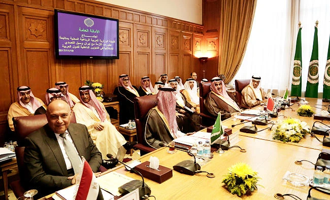 Seated at the table from right to left are Anwar Gargash, UAE Minister of State for Foreign Affairs, Bahraini Foreign Minister Khalid bin Ahmed al-Khalifa, Saudi Arabia's Foreign Minister Adel al-Jubeir, and Egyptian Foreign Minister Sameh Shoukry, during a meeting at the Arab League headquarters in Cairo, Egypt, Sunday, Nov. 19, 2017. The foreign ministers of four Arab nations are meeting in Cairo to discuss a draft Saudi declaration on countering Iranian influence in Arab affairs. (AP Photo/Nariman El-Mofty)