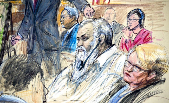 File courtroom sketch depicts Ahmed Abu Khattala listening to a interpreter through earphones during the opening statement by assistant US Attorney John Crabb, 2nd from left, at federal court in Washington, in the trial. (AP)