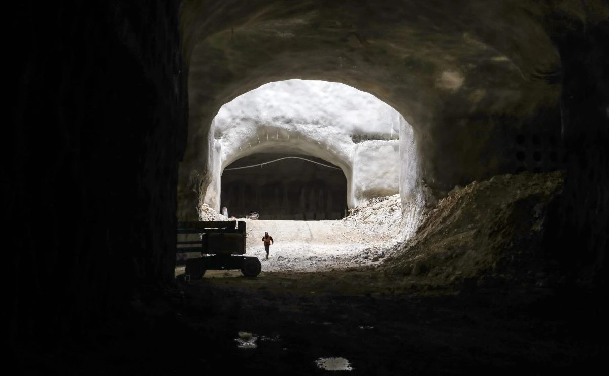 A picture taken on Nov. 21, 2017, shows workers working at the underground burial site dug below Jerusalem’s Har Hamenuhot Jewish cemetery. A shortage of burial space in Jerusalem along with the requirements of Jewish law have brought together religious undertakers and a tunnelling expert to create the new underground complex. (AFP/Menahem Kahana)