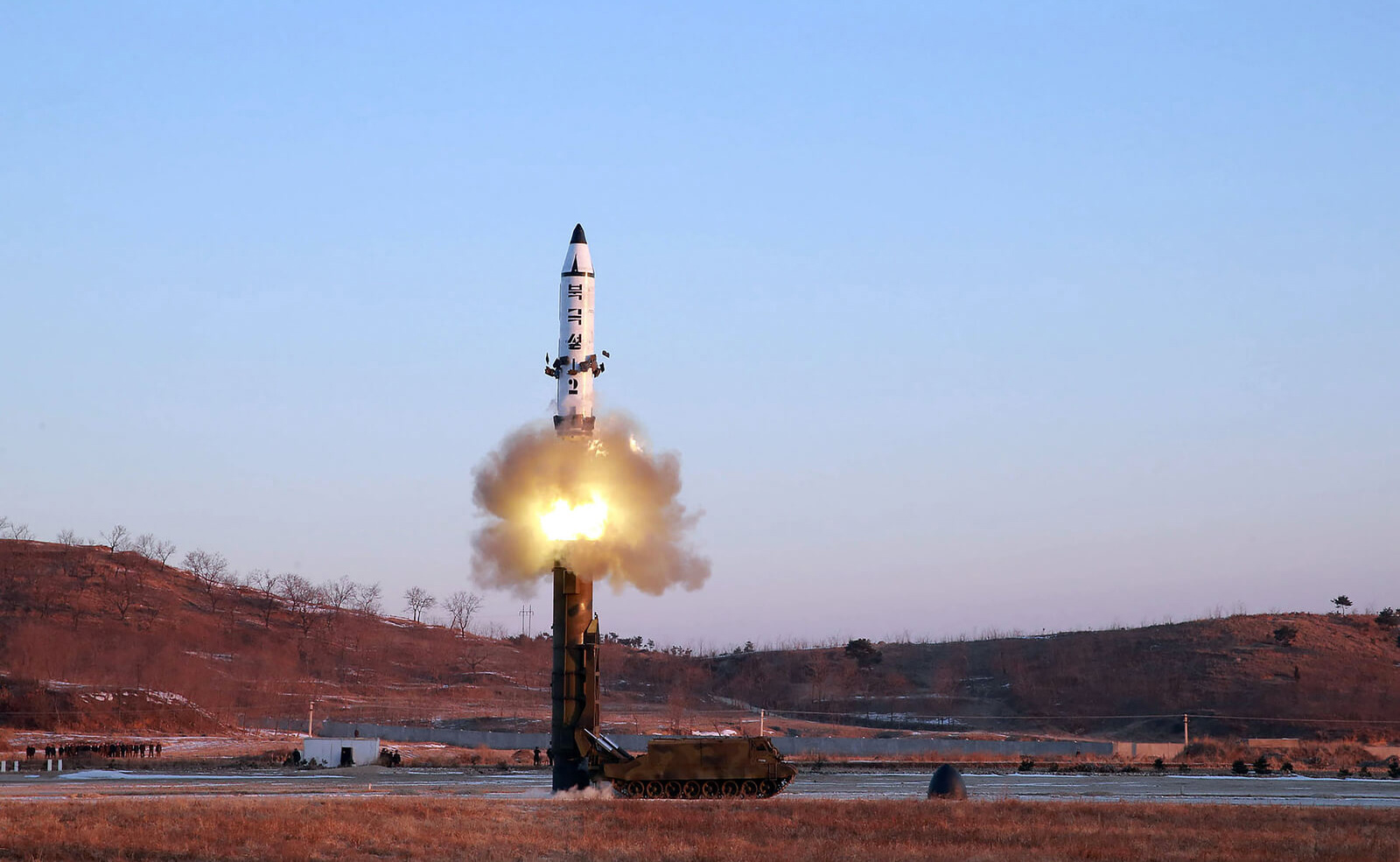 February 12 — This handout photo by North Korea's state-run news agency shows the test-firing of a new ballistic missile that traveled 500 kilometers (310 miles) before landing in the Sea of Japan, also known as the East Sea. (AFP)