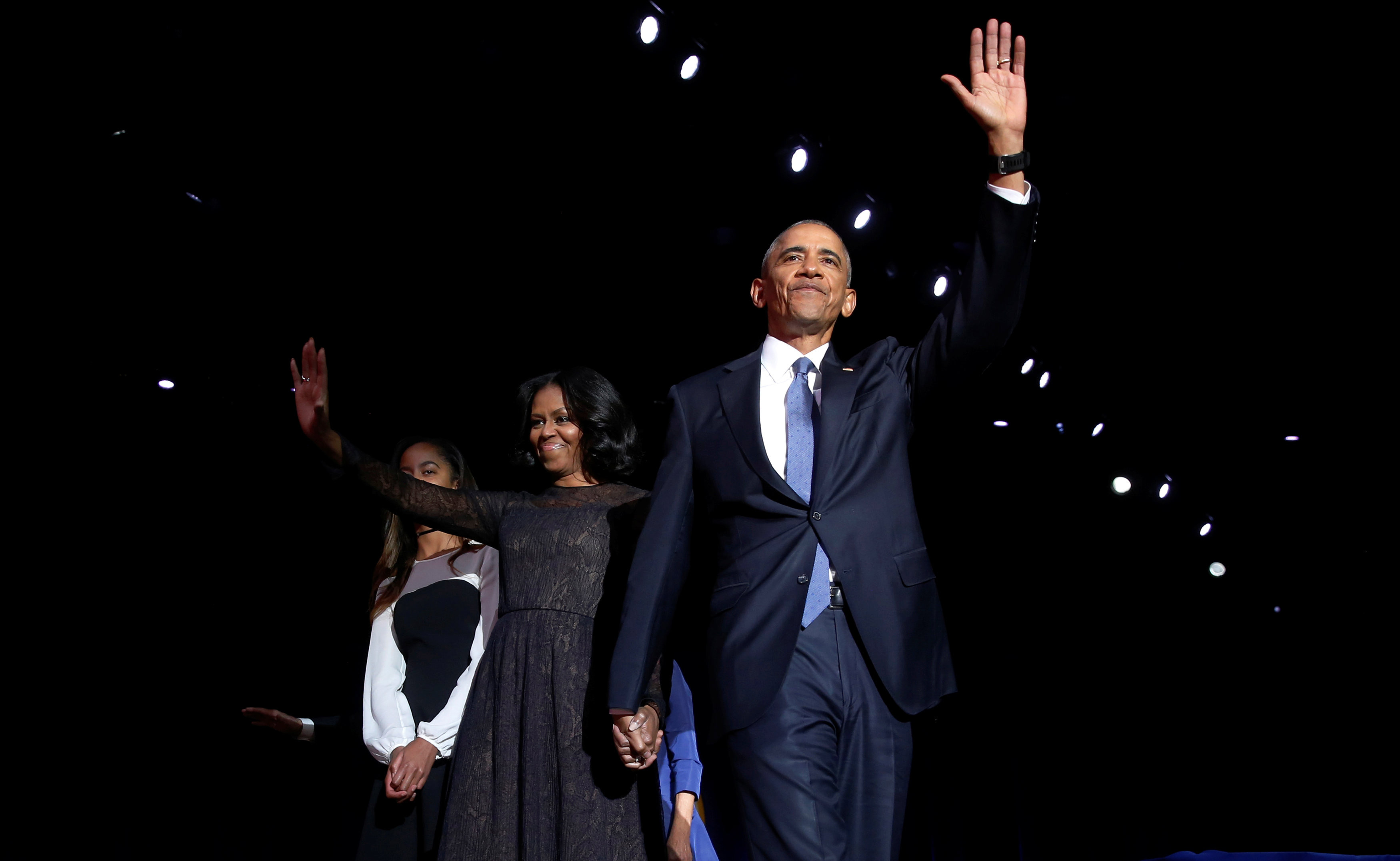 January 10, 2017 — U.S. President Barack Obama, right, is joined onstage by first lady Michelle Obama and daughter Malia, after his farewell address in Chicago, Illinois, U.S. (REUTERS)