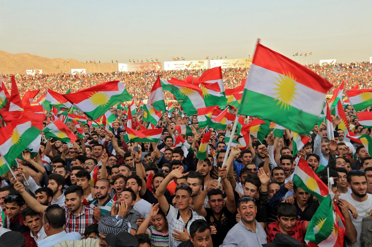 September 16, 2017 — Kurdish people attend a rally to show their support for the September 25th independence referendum in Duhuk, Iraq. (REUTERS)