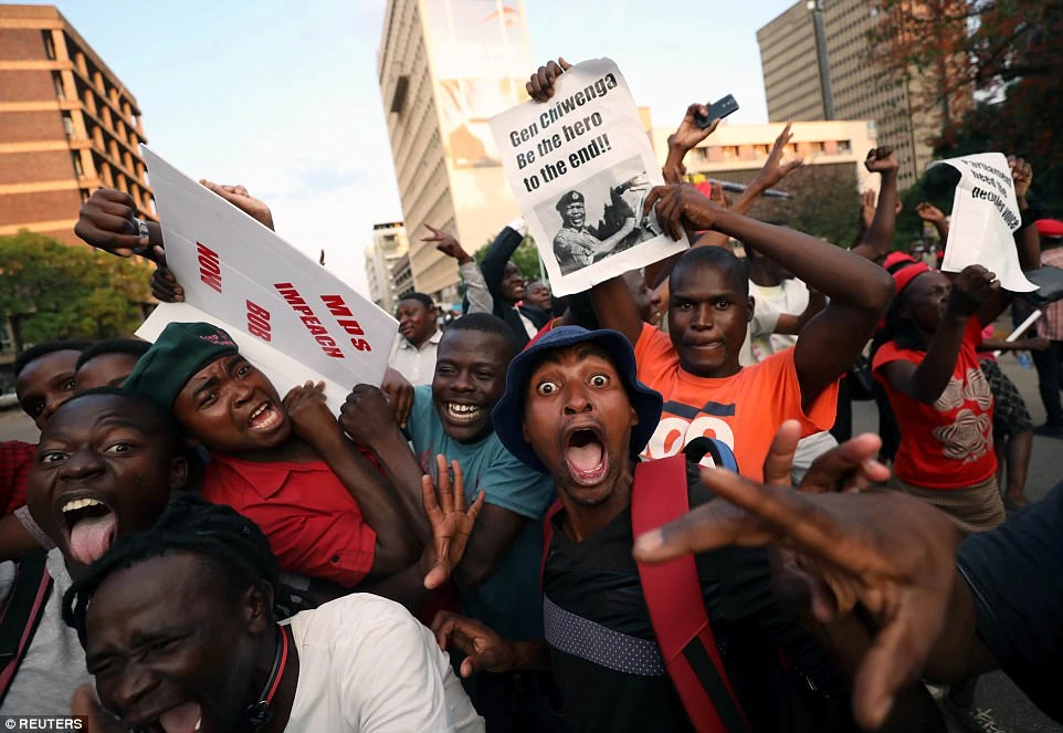 November 21, 2017 — Zimbabweans in Harare celebrated after President Robert Mugabe resigned, bringing an end to 37 years of rule. Emmerson Mnangagwa became president following a dramatic week in which the military took charge. (REUTERS)