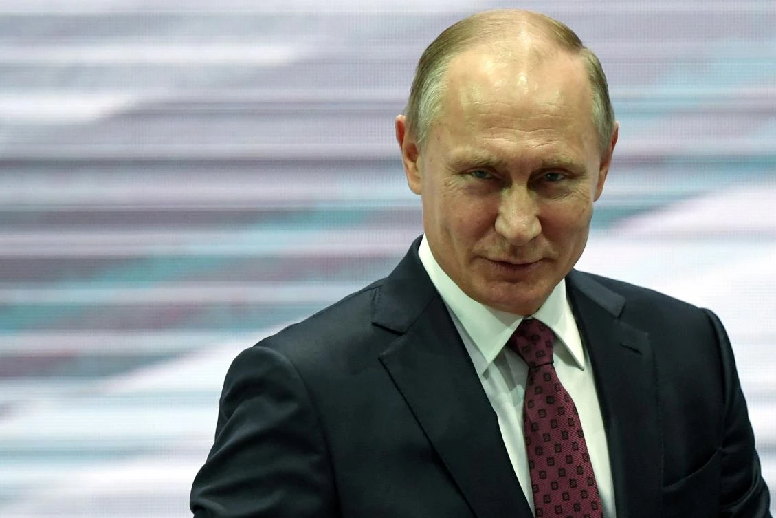 Russian President Vladimir Putin earlier signed a law allowing the Russian authorities to designate some foreign media as “foreign agents.” (AFP)