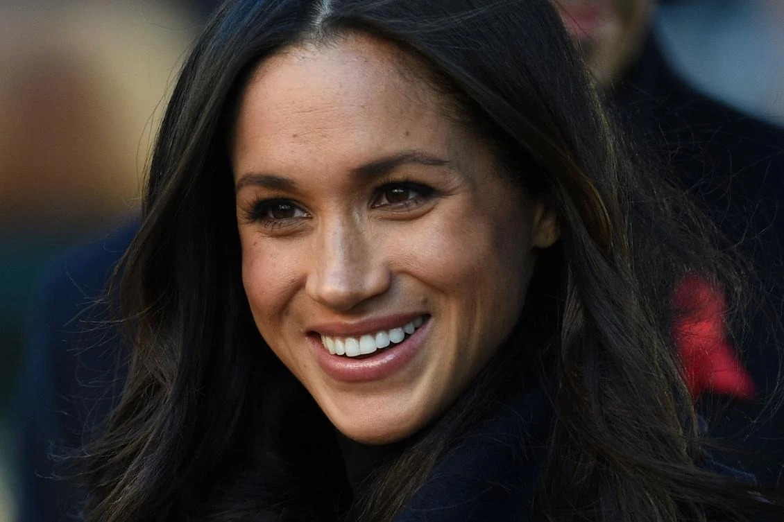 Britain’s Prince Harry’s fiancee US actress Meghan Markle greets wellwishers on a walkabout as they arrive for an engagement at Nottingham Contemporary in Nottingham, central England, on Dec. 1, 2017 which is hosting a Terrence Higgins Trust World AIDS Day charity fair. Prince Harry and Meghan Markle visited Nottingham in their first set of engagements together since announcing their engagement. (AFP/Oli Scarff)