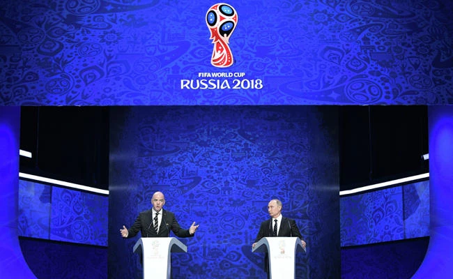 Russia coach happy to dodge Spain in World Cup draw