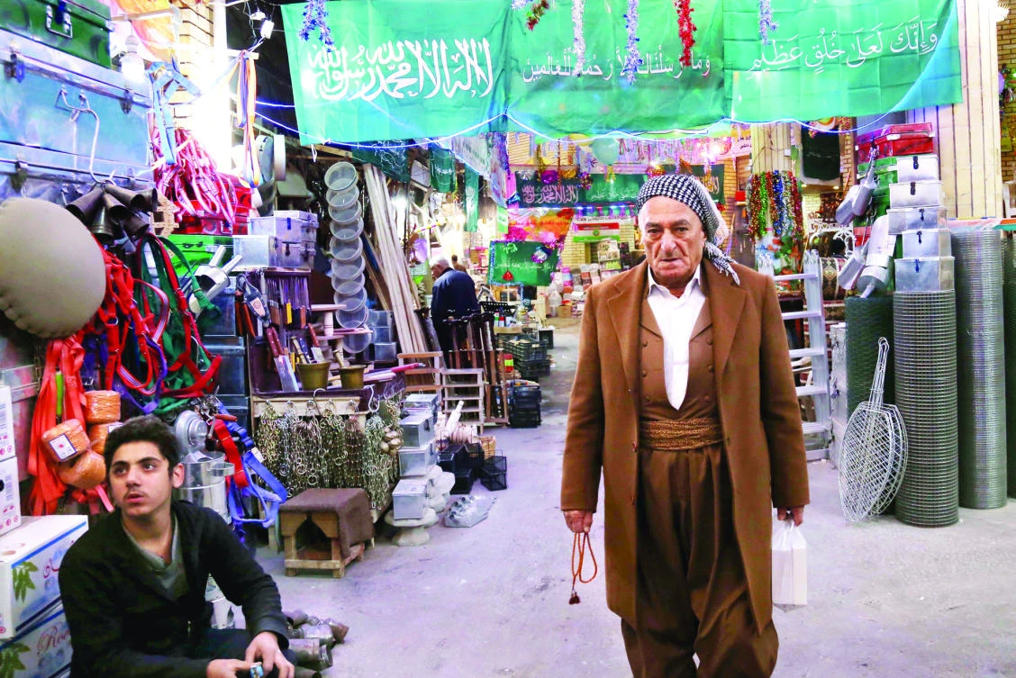 Iraqi Kurds in the old market in Irbil, the capital of the autonomous Kurdish region of northern Iraq. (AFP)