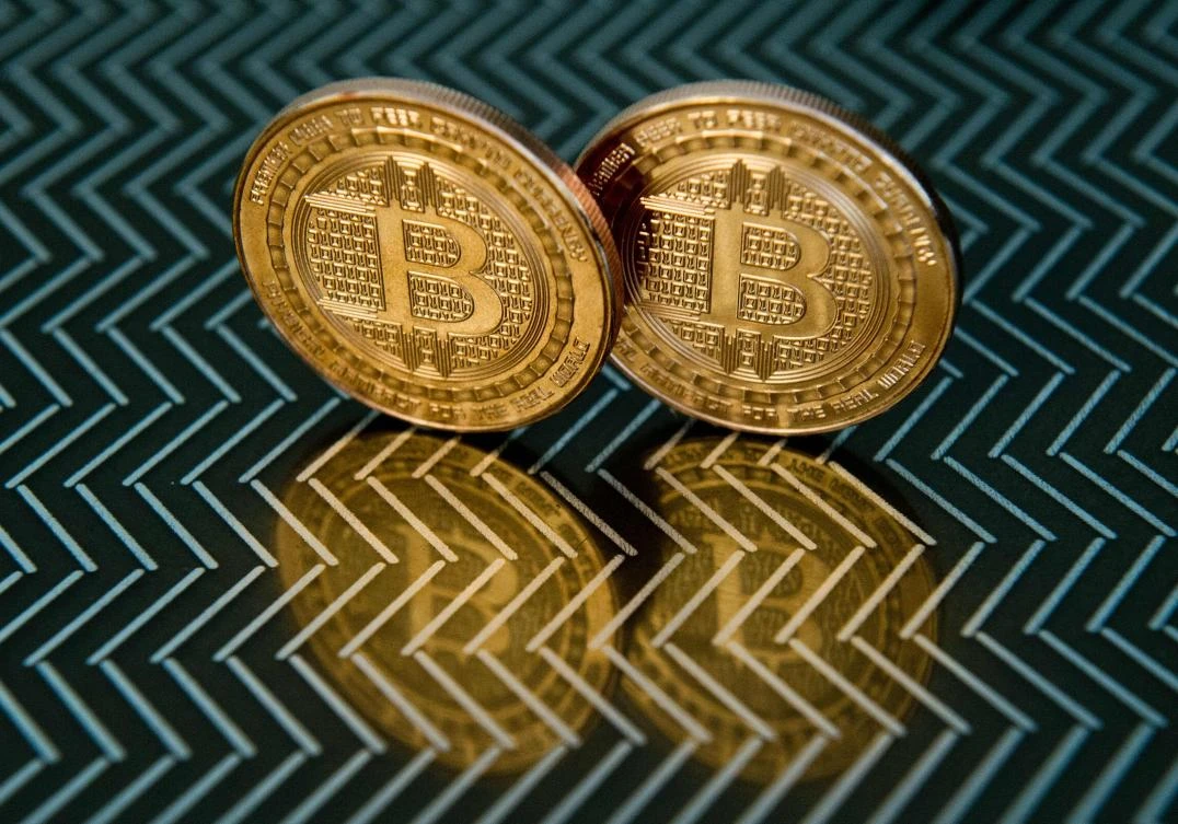 Investors’ interest has been piqued by the cryptocurrency’s surging value, which topped $11,000 for the first time on November 29, 2017. Above, bitcoin medals. (AFP)