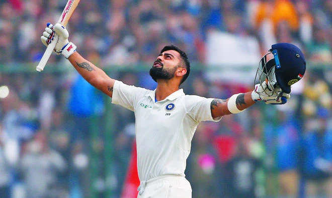 Virat Kohli celebrates scoring his sixth double hundred, against Sri Lanka in New Delhi yesterday. (AP)