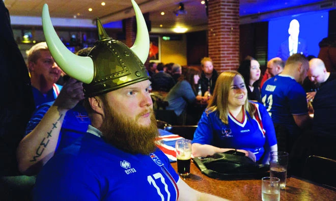Iceland fans watch the 2018 World Cup draw from a sports bar in Reykjavik (AP)