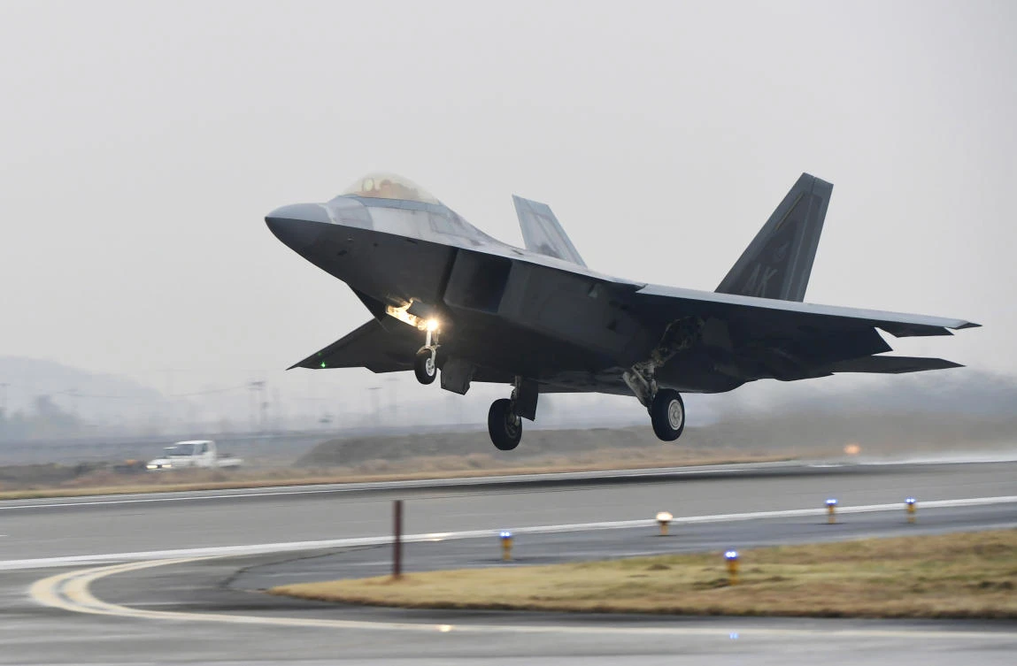 A US Air Force F-22 Raptor takes off from a South Korean air base in Gwangju, South Korea, Monday, Dec. 4, 2017. (Yonhap via AP)