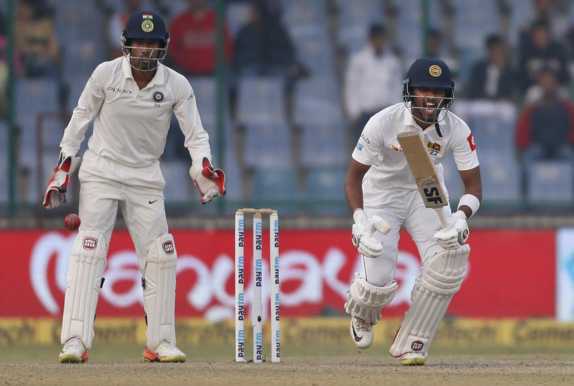 Sri Lanka’s captain Dinesh Chandimal calls for a run during the second day of their third test cricket match against India in New Delhi, India, Sunday, Dec. 3, 2017. (AP)