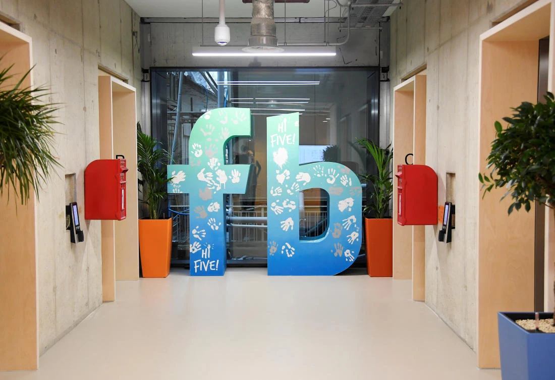 A large logo is seen at Facebook’s headquarters in London, Britain, Dec. 4, 2017. (Reuters/Toby Melville)