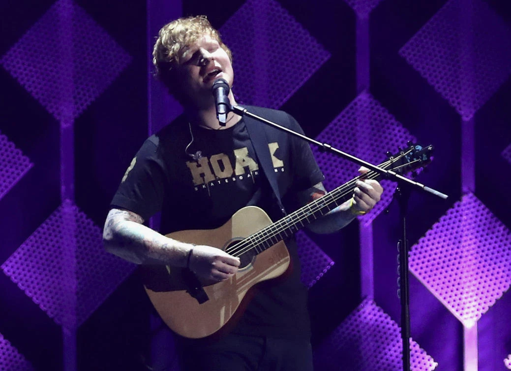 In this Dec. 1, 2017, file photo, Ed Sheeran performs at Jingle Ball at The Forum in Inglewood, California (AP)