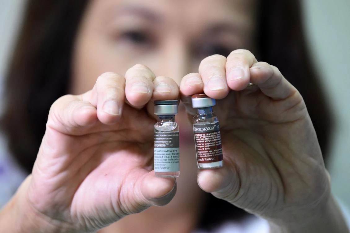 A nurse displays vials of Sanofi’s dengue vaccine Dengvaxia, which have been recalled from local health centers, in the district of Manila on Dec. 5, 2017. Philippines has suspended the sale and distribution of Sanofi’s dengue vaccine, authorities said on December 5, after the French pharmaceutical giant last week warned it could worsen symptoms for people who had not previously been infected. (AFP/Ted Aljibe)