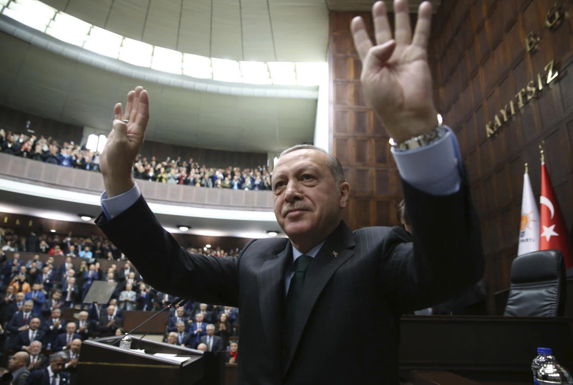 Turkey’s President Recep Tayyip Erdogan waves as he arrives to deliver a speech during a meeting of his ruling Justice and Development Party (AKP), in Ankara, Turkey, Tuesday, Dec. 5, 2017. Erdogan says US recognition of Jerusalem as Israel’s capital is a ‘red line’ for Muslims and also said such a step would lead Turkey to cut off all diplomatic ties with Israel. (Yasin Bulbul/Pool via AP)